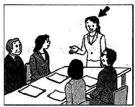 Scene: Four people are in a meeting room. Three women are sitting at a table. A fourth woman is standing and speaking to them, with an arrow pointing to her — from the JLPT N3 Dec 2012 listening section
