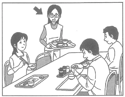 Scene: A woman holding a tray with food is standing next to a dining table where a man and a woman are seated and eating. An arrow points to the standing woman holding the tray — from the JLPT N5 July 2013 listening section